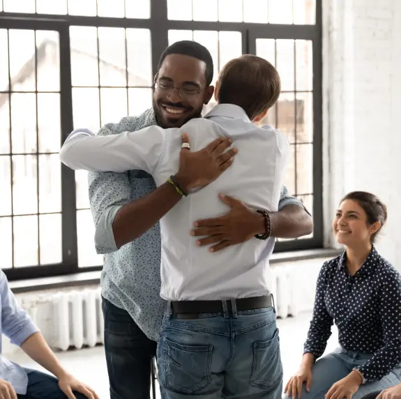 two men hugging